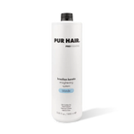 Weiße Brazilian Keratin Strong 1000-ml-Flasche mit schwarzem Verschluss und blauem Label.