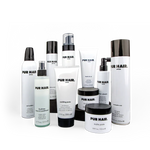 Produktsortiment mit Stylingprodukten im Testpaket für Friseursalons.