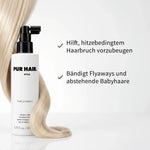 PUR HAIR Heat Protector Hitzeschutzspray neben einer blonden Haarsträhne.