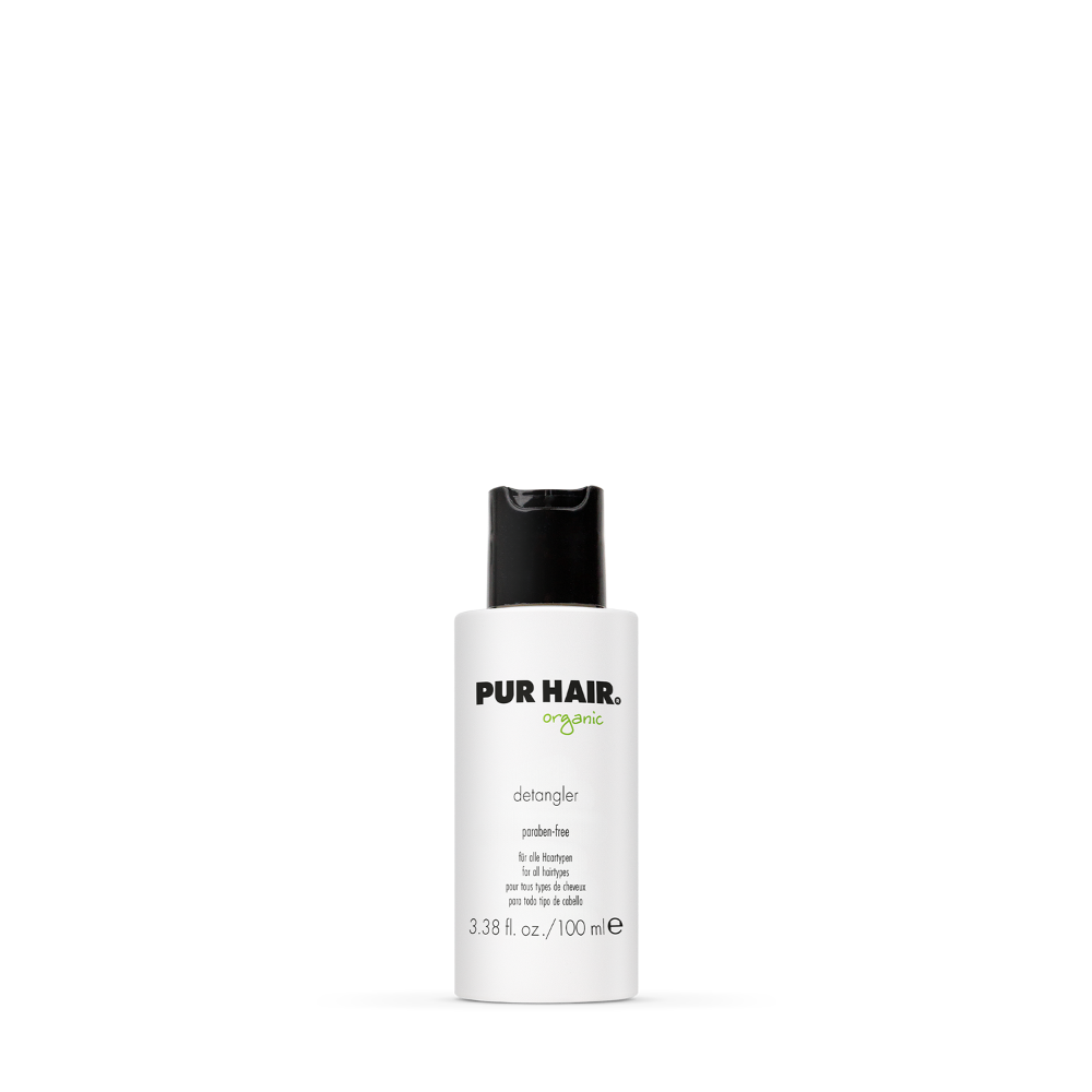 PUR HAIR Detangler, 100 ml Flasche in weiß mit schwarzem Deckel.