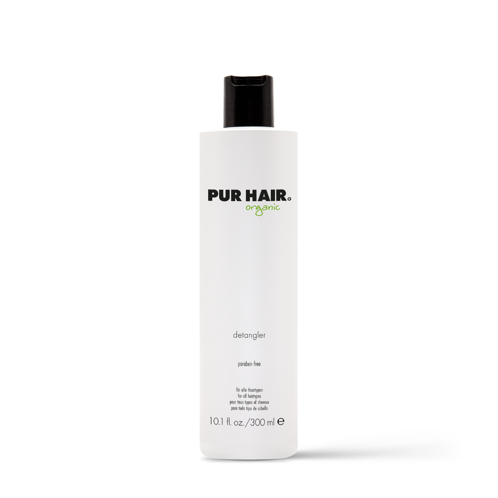 PUR HAIR Detangler, 300 ml Flasche in weiß mit schwarzem Deckel.
