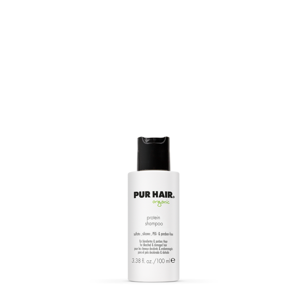 PUR HAIR Organic Protein Shampoo, 100 ml Flasche in Weiß mit schwarzem Deckel.