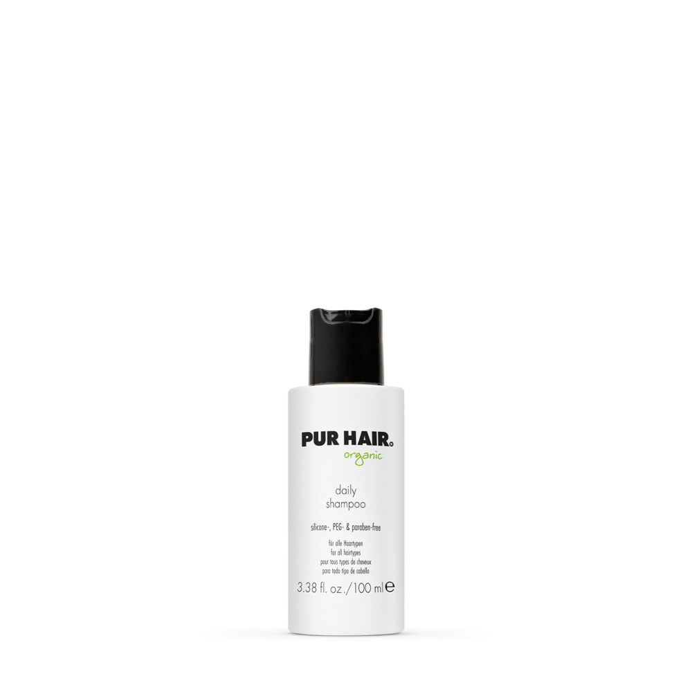 PUR HAIR Organic Daily Shampoo, 100 ml Flasche in Weiß mit schwarzem Deckel.