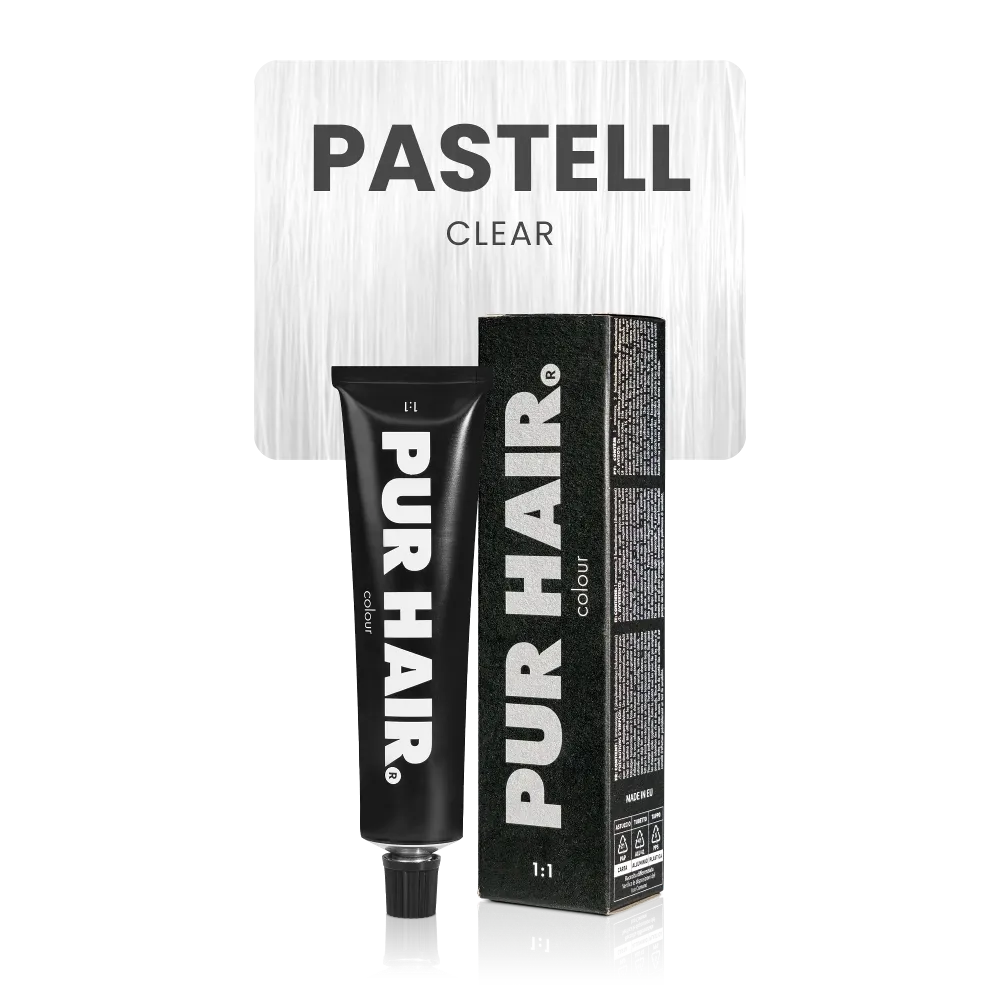 Pastell Clear mit schwarzer Farbtube und Verpackung vor sehr hellen, neutralen Haarsträhne.