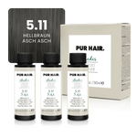 Drei weißen 60-ml-Flaschen, beiger Produktverpackung und kühler dunkel-aschbrauner Haarfarbsträhne.