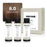 Drei weißen 60-ml-Flaschen, beiger Produktverpackung und natürlicher dunkelblonder Strähne.