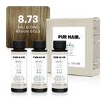 Drei weißen 60-ml-Flaschen, beiger Produktverpackung und warmer goldbraun-blonder Haarfarbsträhne.