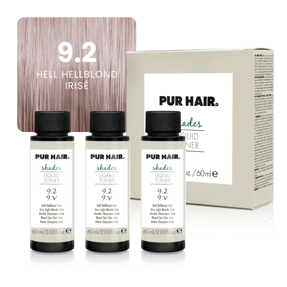 Drei weißen 60-ml-Flaschen, beiger Produktverpackung und sehr heller perlmutt-roséblonder Strähne.