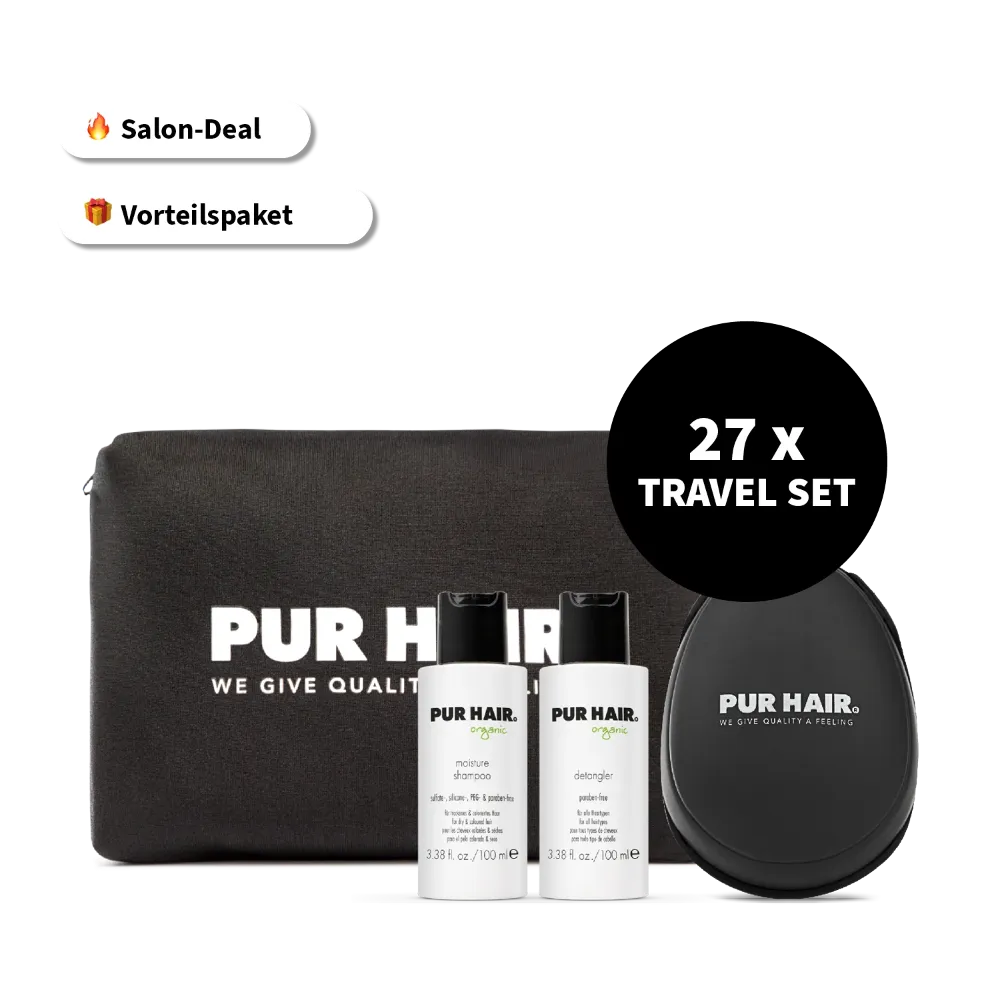 Schwarzer Travel Bag, zwei weißen Organic Haarpflegeflaschen und als 27-teiliges Travel-Set