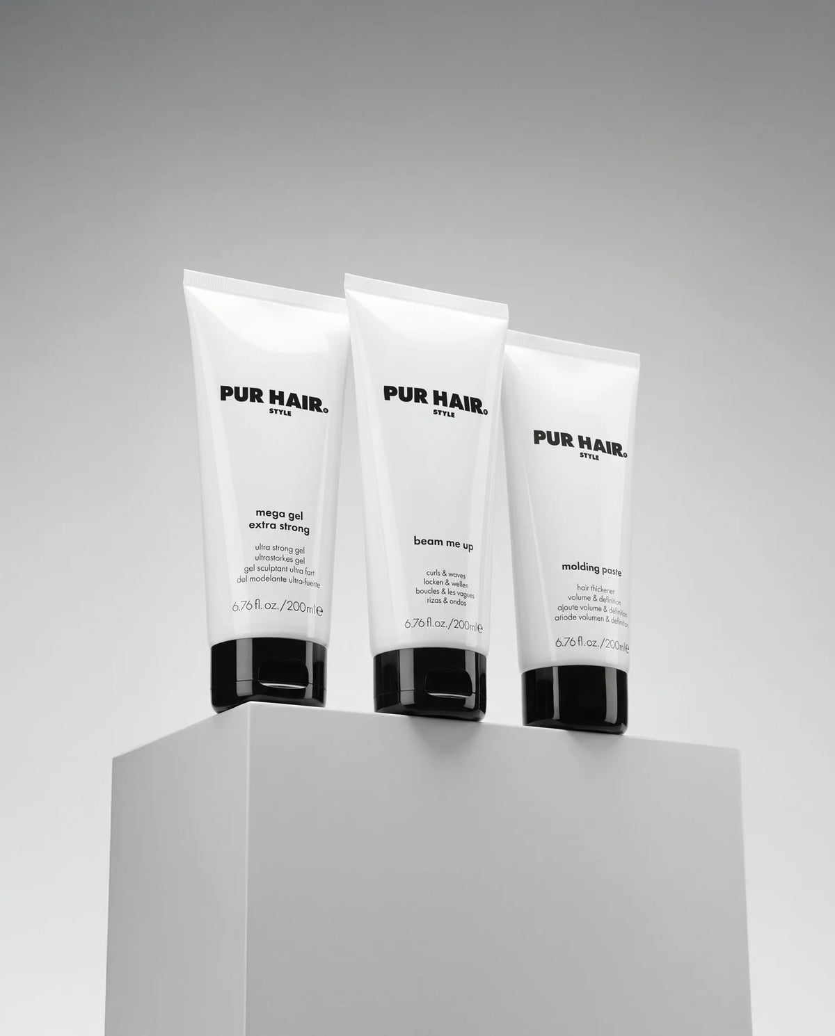 PUR HAIR Stylingprodukte Mega Gel, Beam Me Up und Molding Paste für Halt, Definition, Locken und individuelles Haarstyling.