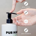 Finger pumpt weißes Shampoo aus PUR HAIR Organic Flasche, Produktmerkmale.