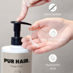 Finger pumpt PUR HAIR Magic Gum Repair Shampoo aus der Flasche in die Handfläche.